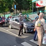 Anggota Satlantas Polres Batu Laksanakan Poros Pagi Di Simpul Rawan Laka dan Rawan Macet